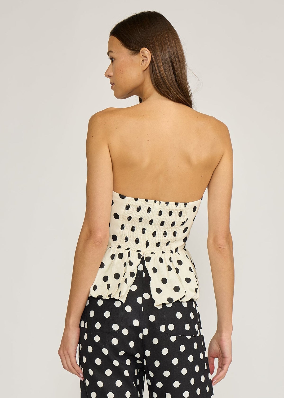 ANYA STRAPLESS PEPLUM TOP