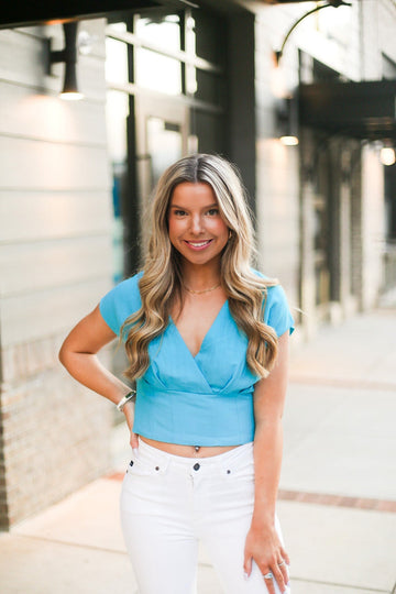 Sleeveless Blue V-Neck Blouse