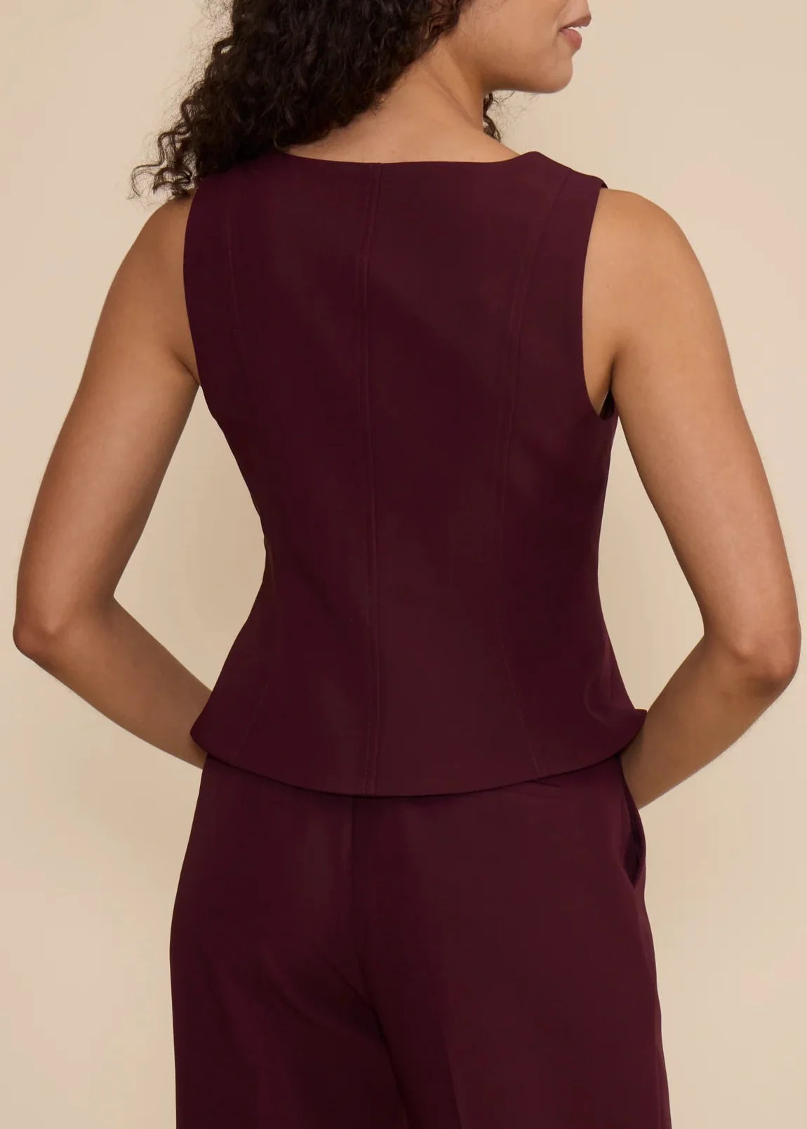 LEANNE SLEEVELESS PEPLUM TOP